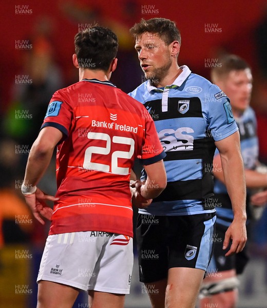 290422 - Munster v Cardiff Rugby - United Rugby Championship - Rhys Priestland of Cardiff and Joey Carbery of Munster after the game