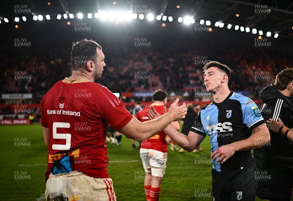 300324 - Munster v Cardiff Rugby - United Rugby Championship - Tadhg Beirne of Munster and Josh Adams of Cardiff