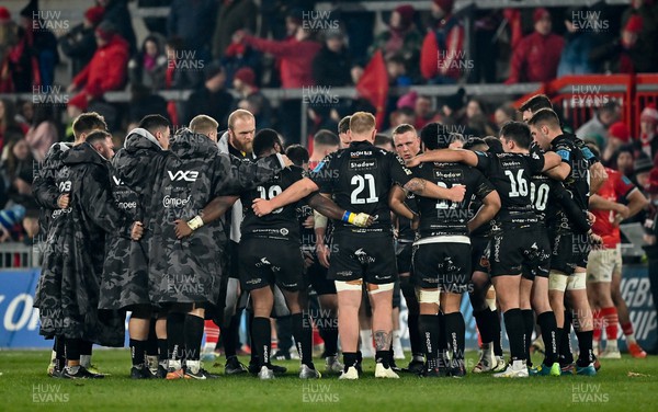 050322 - Munster v Dragons - United Rugby Championship - Dragons team huddle after the match
