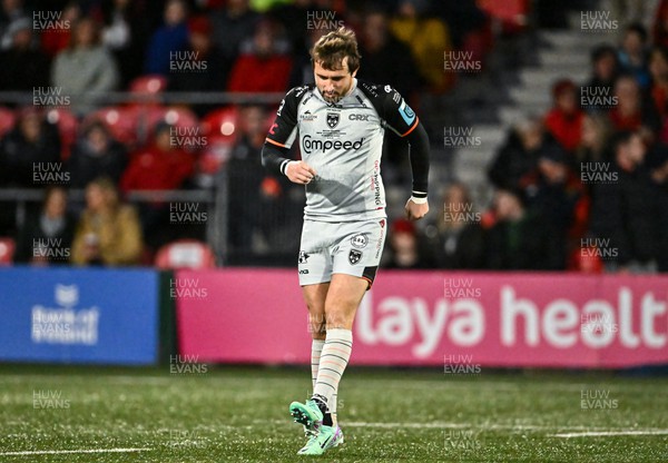 041123 - Munster v Dragons - United Rugby Championship - Rhodri Williams of Dragons leads his team-mates out