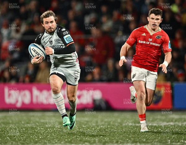 041123 - Munster v Dragons - United Rugby Championship - Rhodri Williams of Dragons gets away from Calvin Nash of Munster