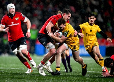 230126 - Munster v Dragons RFC - United Rugby Championship - Aneurin Owen of Dragons in action against Brian Gleeson of Munster