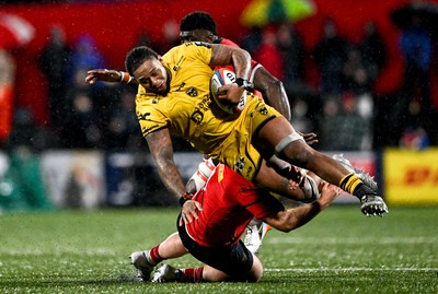 230126 - Munster v Dragons RFC - United Rugby Championship - Levi Douglas of Dragons is tackled by Jeremy Loughman of Munster