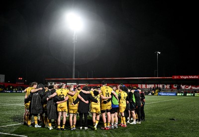 230126 - Munster v Dragons RFC - United Rugby Championship - Dragons players huddle after the match