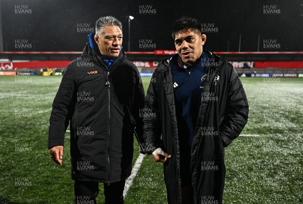 230126 - Munster v Dragons RFC - United Rugby Championship - Michael Ala'alatoa of Munster, right, and Dragons head coach Filo Tiatia after the match