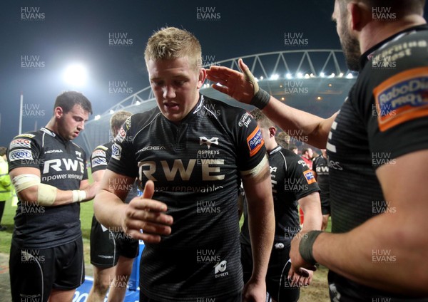 020313 Munster v Ospreys - RaboDirect Pro Lloyd Peers of Ospreys leads his team mates off the pitch after drawing with Munster 