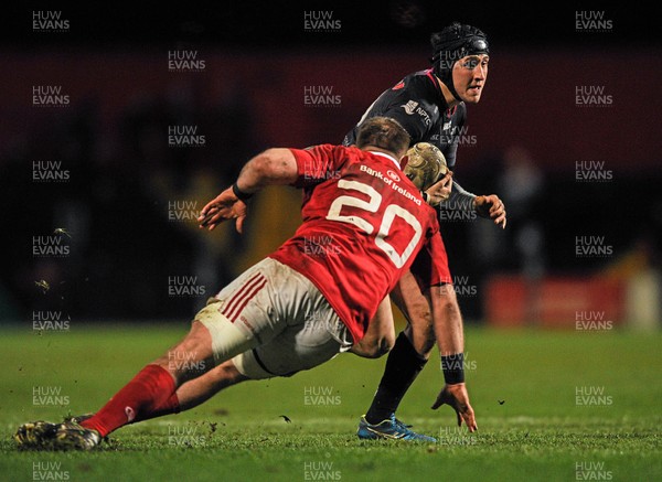 140216 - Munster v Ospreys - Guinness PRO12 - Sam Davies of Ospreys is tackled by Shane Buckley of Munster