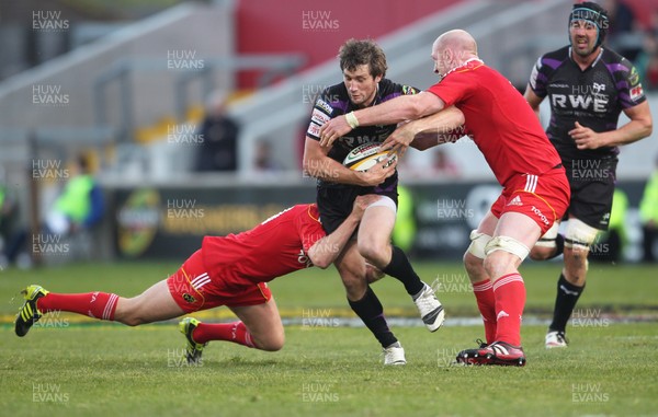 14.05.11 - Musnter v Ospreys... Ospreys'Andrew Bishop is closed down by Munster's Keith Earls and Munster's Paul O'Connell. 