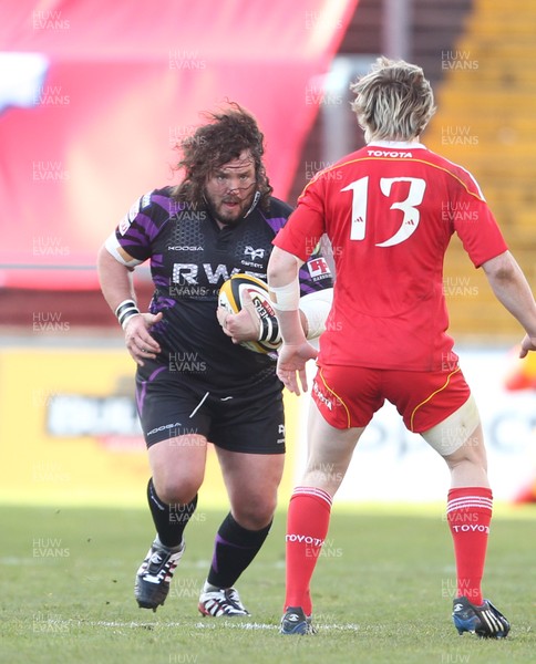 14.05.11 - Musnter v Ospreys... Ospreys' Adam Jones takes on Munster's Danny Barnes. 