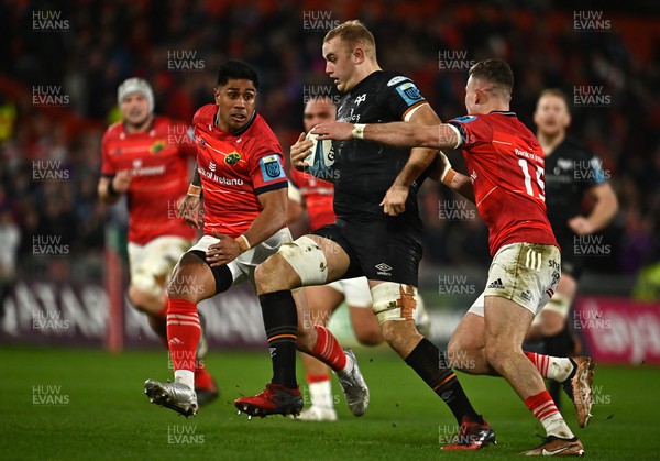 170223 - Munster v Ospreys - United Rugby Championship - Huw Sutton of Ospreys in action against Shane Daly, right, and Malakai Fekitoa of Munster