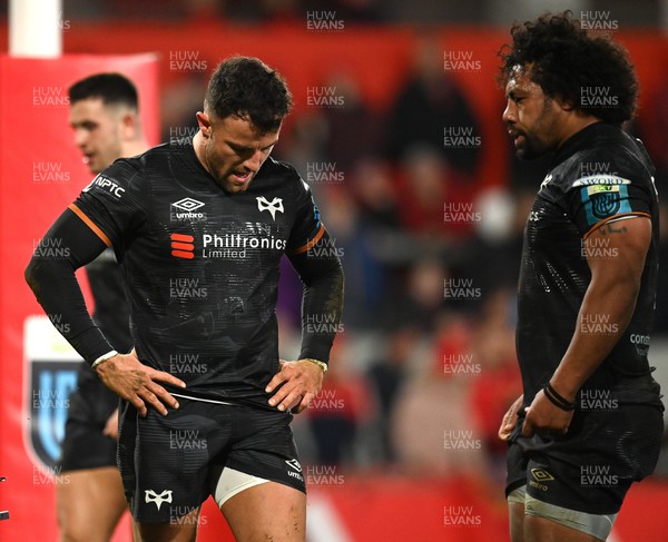170223 - Munster v Ospreys - United Rugby Championship - Luke Morgan, left, and Elvis Taione of Ospreys after conceding a try