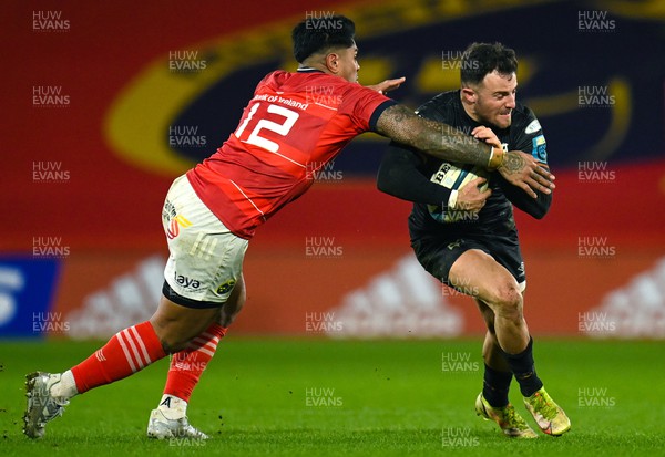 170223 - Munster v Ospreys - United Rugby Championship - Luke Morgan of Ospreys is tackled by Malakai Fekitoa of Munster