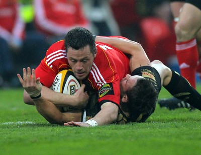 24.04.10  Munster v Ospreys... Munster's James Coughlan and Lee Byrne of Ospreys. 