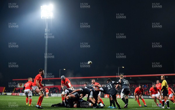251019 - Munster v Ospreys - Guinness PRO14 -  Reuben Moran-Williams of Ospreys performs a box kick under pressure