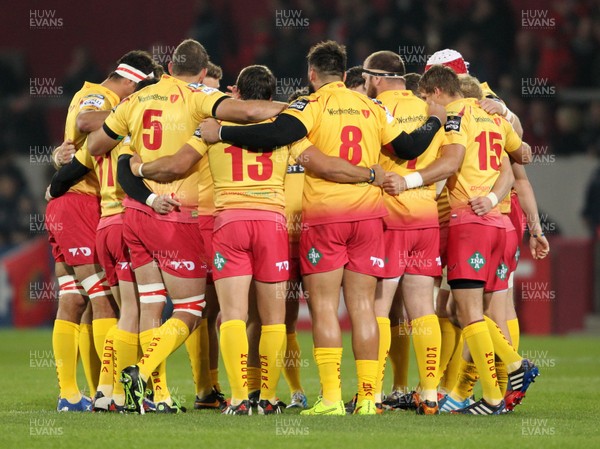 101014 - Munster v Scarlets - Guinness PRO12 -The Scarlets huddle before the start of the game