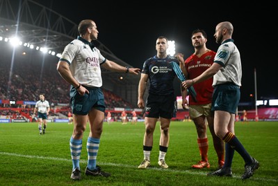 150225 - Munster v Scarlets - United Rugby Championship - Referee Federico Vedovelli with Gareth Davies of Scarlets