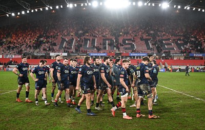 150225 - Munster v Scarlets - United Rugby Championship - Scarlets players after their side's defeat