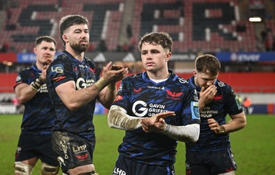 150225 - Munster v Scarlets - United Rugby Championship - Macs Page of Scarlets and teammates after their side's defeat