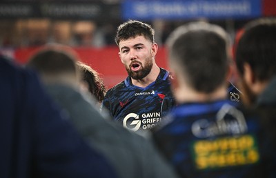 150225 - Munster v Scarlets - United Rugby Championship - Max Douglas of Scarlets talks to teammates