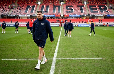 150225 - Munster v Scarlets - United Rugby Championship - Alec Craig of Scarlets walks the pitch before the match