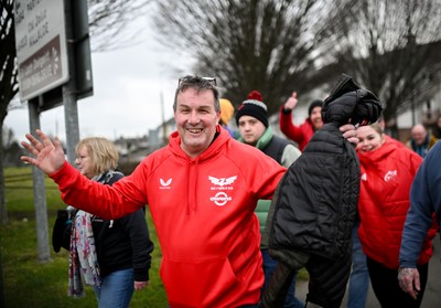 150225 - Munster v Scarlets - United Rugby Championship - A Scarlets supporter arrives before the match