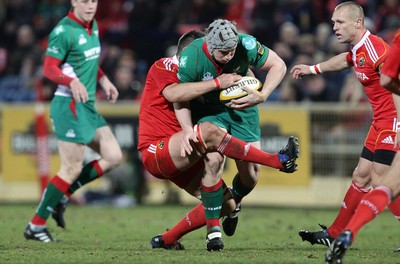 18.03.10 Munster v Scarlets... Munster's Niall Ronan and Jonathan Davies of Llanelli Scarlets. 