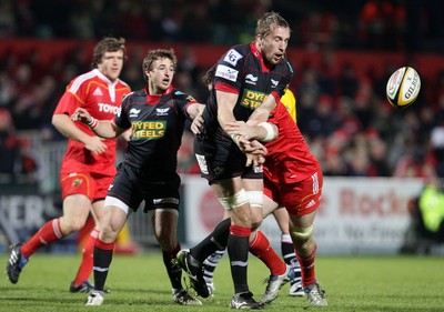 21.11.10 - Munster v Scarlets, Magners League Scarlets's Dominic Day gets tackled 