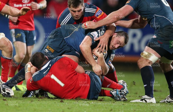 211213 - Munster v Llanelli Scarlets - RaboDirect Pro12Scarlets' Ken Owens under pressure(c) Huw Evans Picture Agency