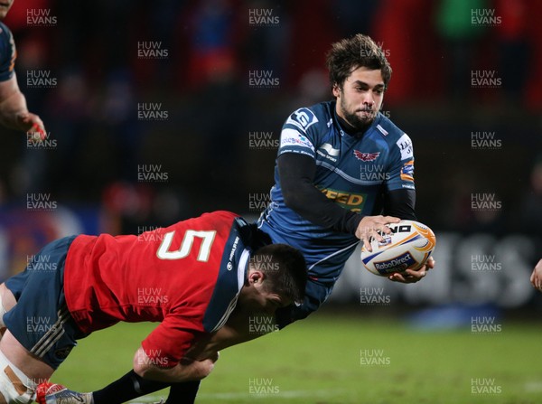 211213 - Munster v Llanelli Scarlets - RaboDirect Pro12Scarlets' Gareth Owen is tackled by MunsterÕs Billy Holland(c) Huw Evans Picture Agency