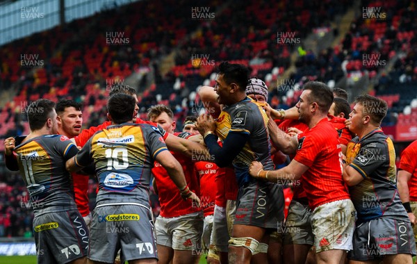 290220 - Munster v Scarlets - Guinness PRO14 -  Sam Lousi of Scarlets tussles with Munster players, before receiving a red card