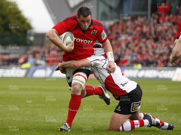 080412 Munster v Ulster - Heineken Cup - James Coughlan of Munster is tackled by Tom Court of Ulster 