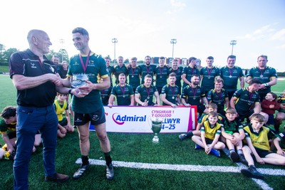 100525 - Nant Conwy League Trophy Presentation - Admiral National League 1 North - Caron Davies receives the trophy from WRU District Representative Alun Roberts