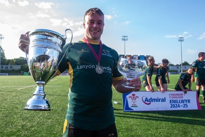 100525 - Nant Conwy League Trophy Presentation - Admiral National League 1 North - Nant Conwy’s Emlyn Jones poses with both the League trophy and Cup