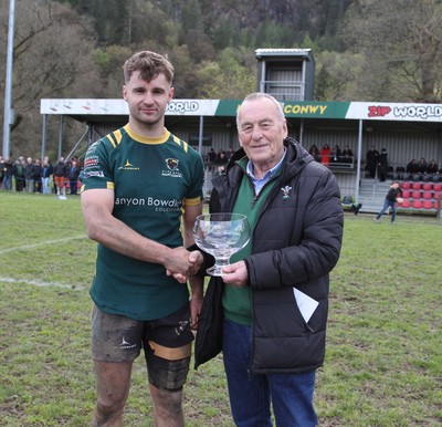 180426 - Nant Conwy v Wrexham - Admiral National League 1 North - Nant Conwy captain Caron Davies is presented with the trophy by Hywel Roberts