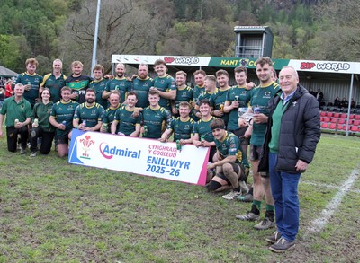 180426 - Nant Conwy v Wrexham - Admiral National League 1 North - Nant Conwy captain Caron Davies is presented with the trophy by Hywel Roberts
