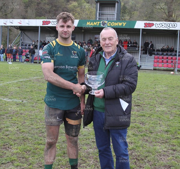 180426 - Nant Conwy v Wrexham - Admiral National League 1 North - Nant Conwy captain Caron Davies is presented with the trophy by Hywel Roberts