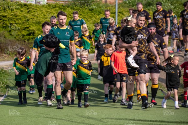 100525 - Nant Conwy v Bethesda - North Wales Division 1 Cup Final - Players enter the field with mascots ahead of kick off