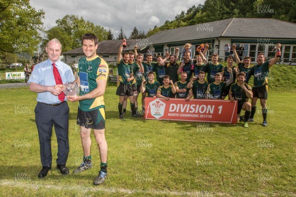 120518 - Nany Conwy v Llangefni - WRU National Division 1 North -  WRU representative Alwyn Jones presents the trophy to Nant Conwy captain Ifan Jones
