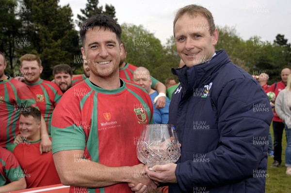 060517 - Nantyffyllon RFC  v Abercrave RFC                           WRU National League 3 West Central A Nantyffyllon captain, Jonny Phillips, left, receives the trophy from WRU Board member Chris Morgan, right