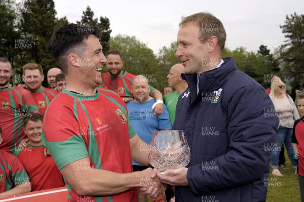 060517 - Nantyffyllon RFC  v Abercrave RFC                           WRU National League 3 West Central A Nantyffyllon captain, Jonny Phillips, left, receives the trophy from WRU Board member Chris Morgan, right