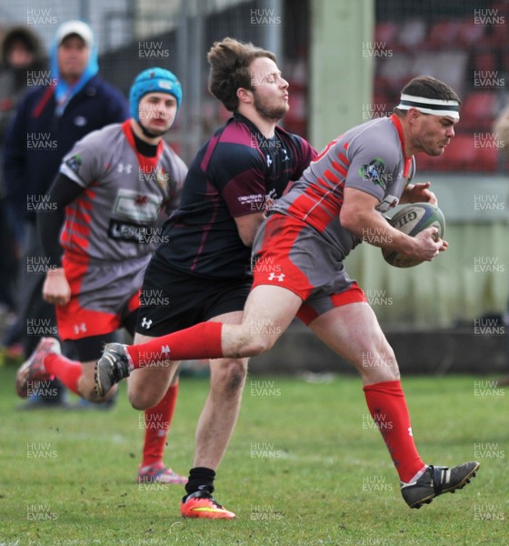 230416 -Nantyglo v Bedlinog-SSE SWALEC Division 1-Nantyglo's Sean Thomas makes safe a loose ball