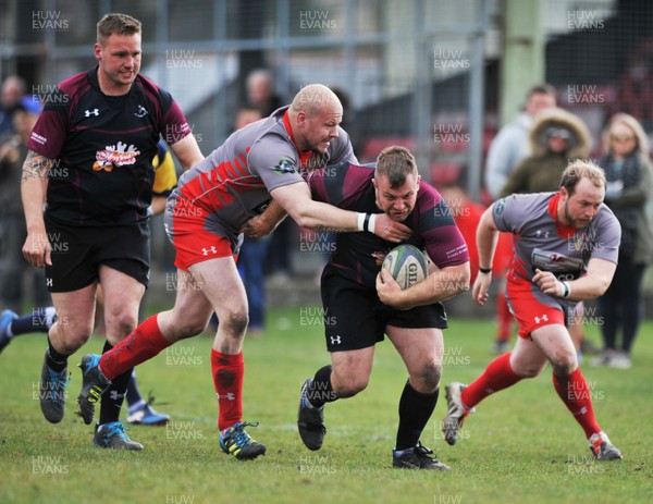 230416 -Nantyglo v Bedlinog-SSE SWALEC Division 1-Bedlinog's Rhys James is tackled by Nantyglo's Nick Phippen