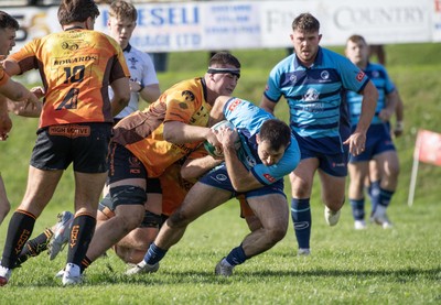 101026 - Narberth v Pontypridd - Admiral WRU Premiership - Narberth’s Lewys Gibby is tackled by Mitch Barnard