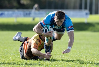 101026 - Narberth v Pontypridd - Admiral WRU Premiership - Narberth’s Llan Phillips is tackled by Jorge Lacey