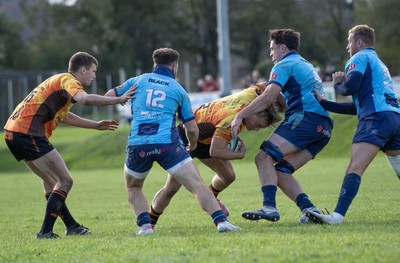101026 - Narberth v Pontypridd - Admiral WRU Premiership - Pontypridd’s Ethan Williams is tackled by Caleb Salmon