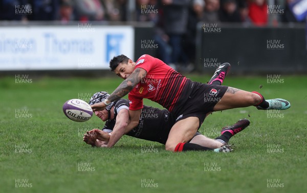261223 - Neath RFC v Aberavon RFC, Indigo Group Welsh Premiership - Jay Baker of Aberavon and Ryan Griffiths of Neath compete for the ball