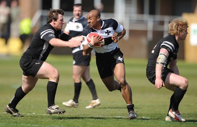 17.04.10 - Neath v Bedwas - Principality Premiership - Neath's Nathan Brew beats Kieron Crawford to score try. 