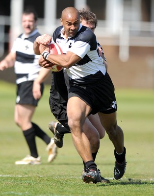 17.04.10 - Neath v Bedwas - Principality Premiership - Neath's Nathan Brew beats Kieron Crawford to score try. 