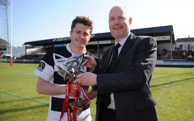 17.04.10 - Neath v Bedwas - Principality Premiership - Neath captain Arwel Thomas receives the Principality Premiership trophy from Principality Director of IT John Williams. 