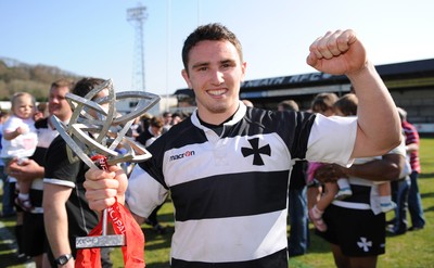 17.04.10 - Neath v Bedwas - Principality Premiership - Kristian Phillips celebrates with the Principality Premiership trophy. 